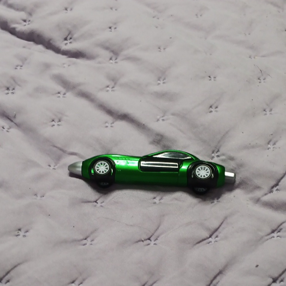 Vibrant Green and Black Aerodynamic Model Car